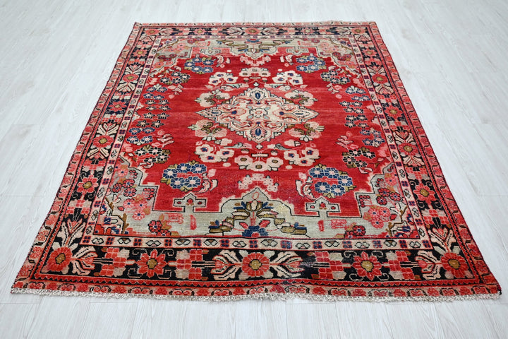 red Medium rug 5' 1" x 6' 5"