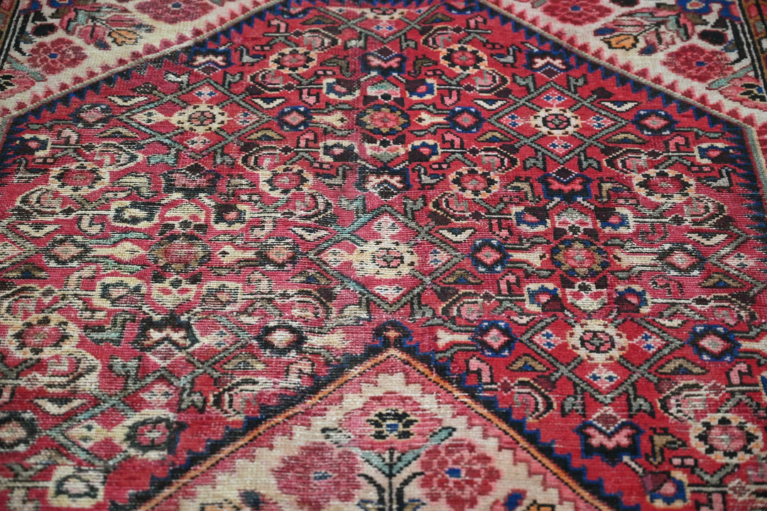 red Large rug 5' 5" x 10' 5"