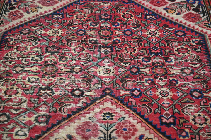 red Large rug 5' 5" x 10' 5"