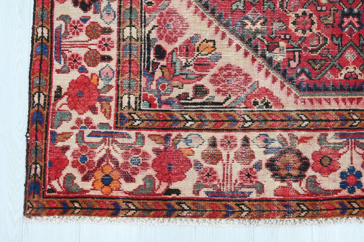 red Large rug 5' 5" x 10' 5"