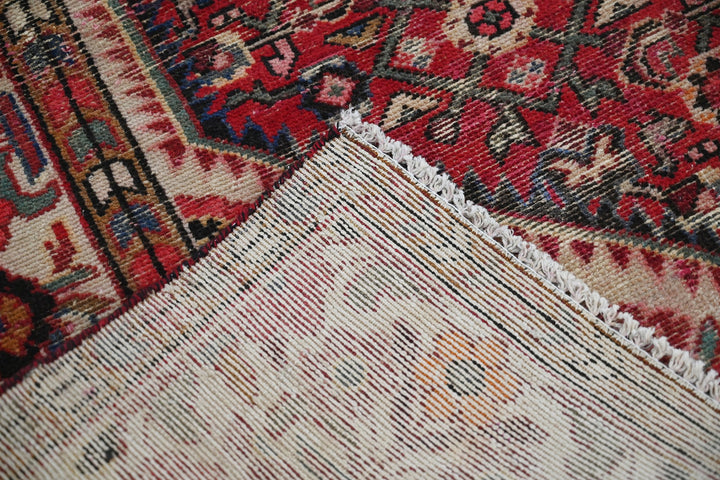 red Large rug 5' 5" x 10' 5"
