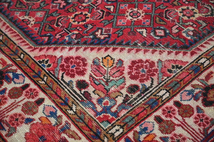 red Large rug 5' 5" x 10' 5"