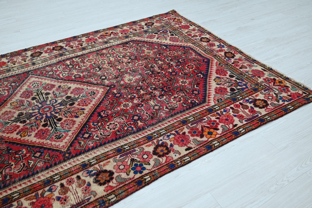 red Large rug 5' 5" x 10' 5"