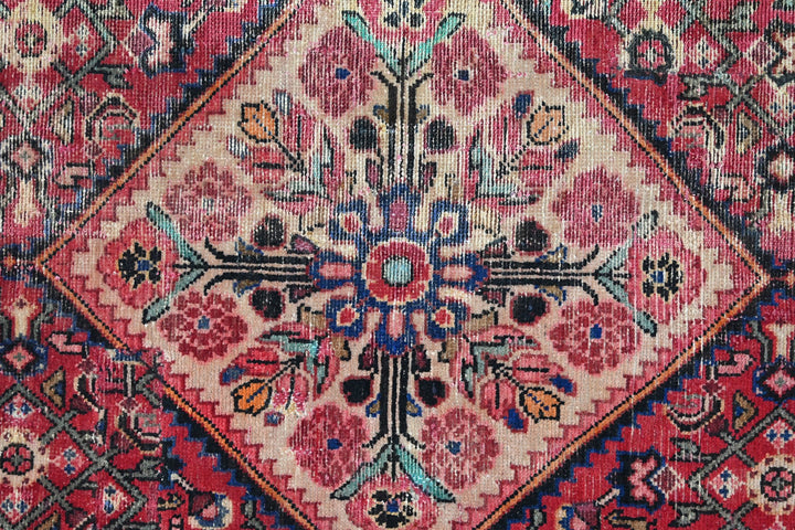 red Large rug 5' 5" x 10' 5"