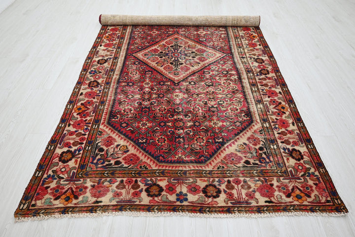red Large rug 5' 5" x 10' 5"