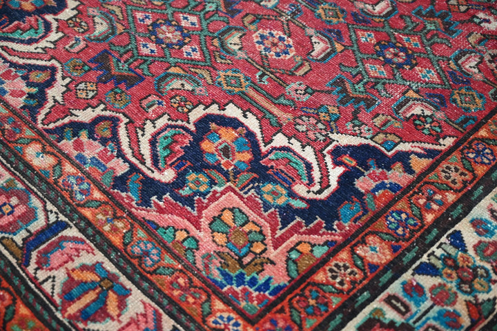 red Large rug 4' 7" x 9' 11"