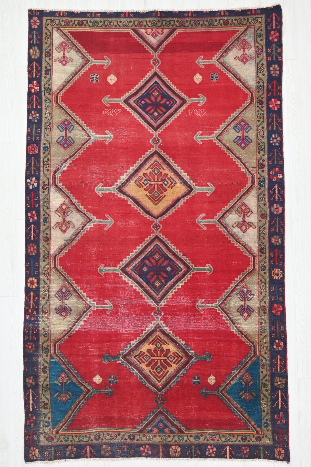 red Medium rug 4' 8" x 8' 6"