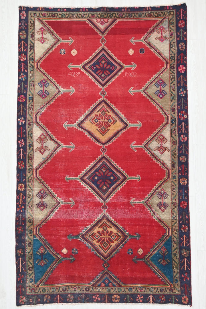 red Medium rug 4' 8" x 8' 6"
