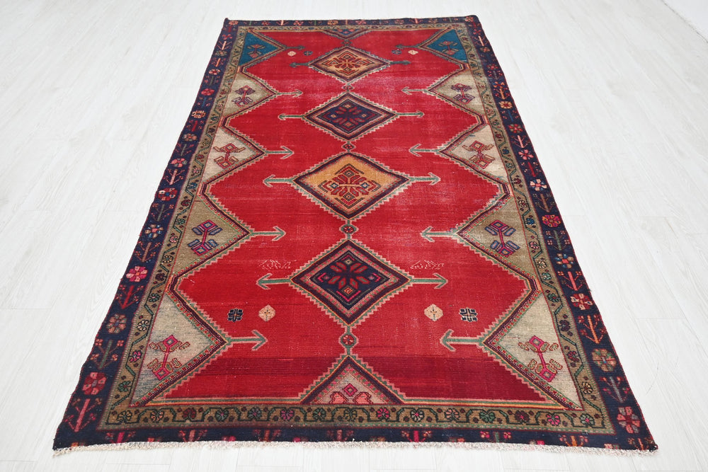 red Medium rug 4' 8" x 8' 6"
