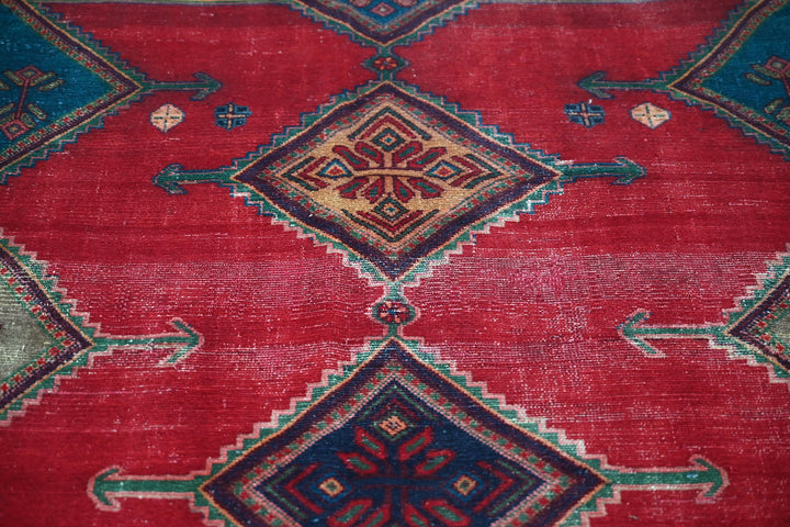 red Medium rug 4' 8" x 8' 6"