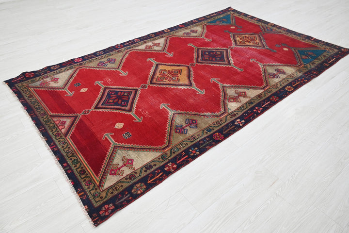 red Medium rug 4' 8" x 8' 6"