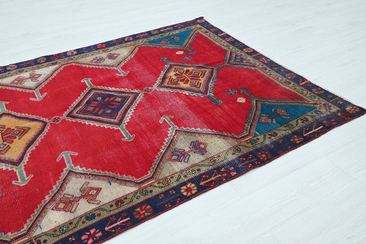 red Medium rug 4' 8" x 8' 6"