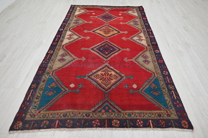 red Medium rug 4' 8" x 8' 6"
