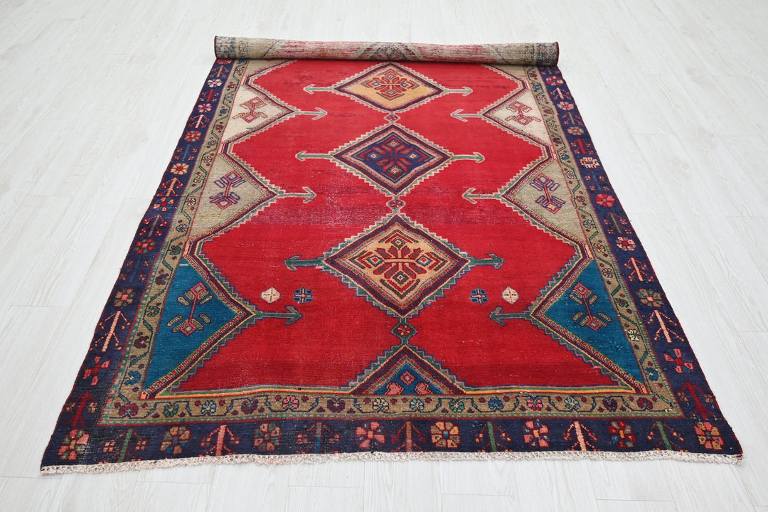 red Medium rug 4' 8" x 8' 6"