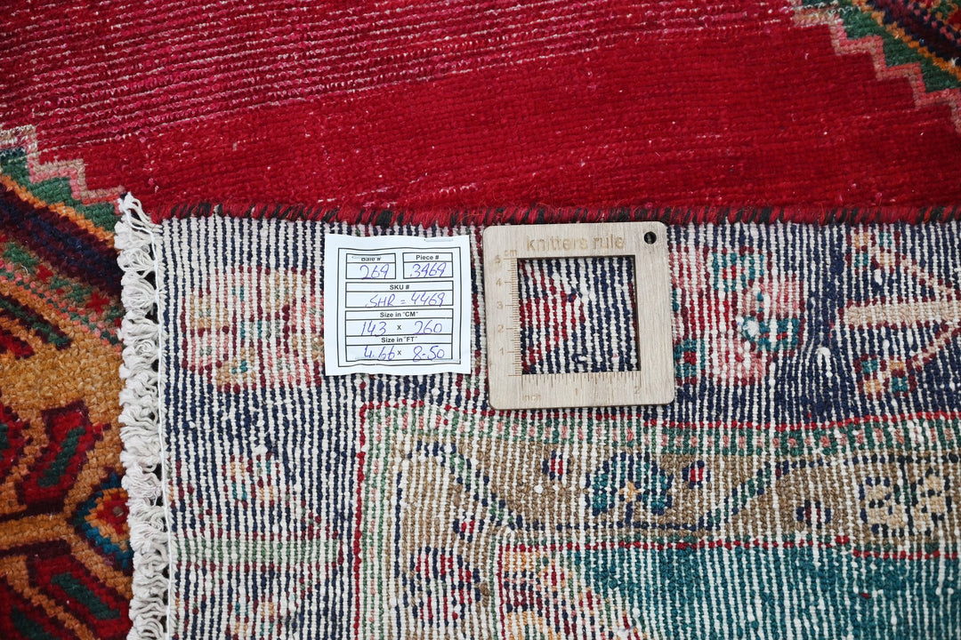 red Medium rug 4' 8" x 8' 6"