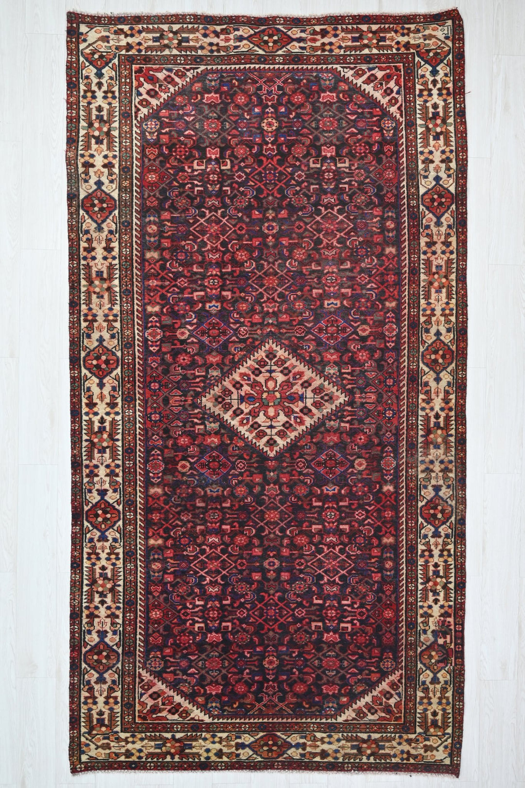 red Large rug 5' 2" x 10' 10"