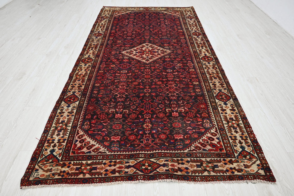 red Large rug 5' 2" x 10' 10"