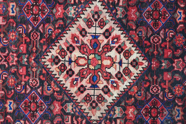 red Large rug 5' 2" x 10' 10"
