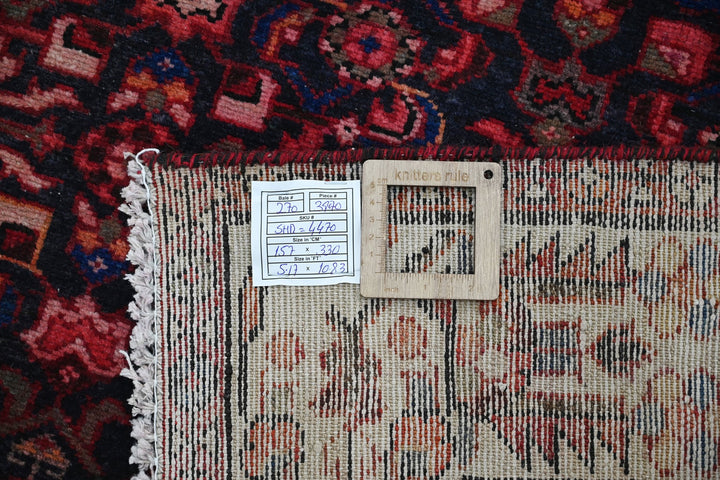 red Large rug 5' 2" x 10' 10"