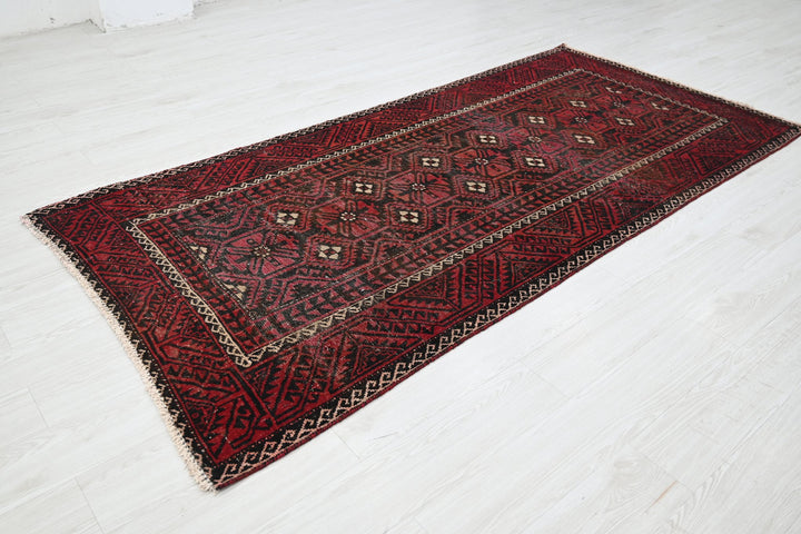 red Medium rug 4' 0" x 8' 5"
