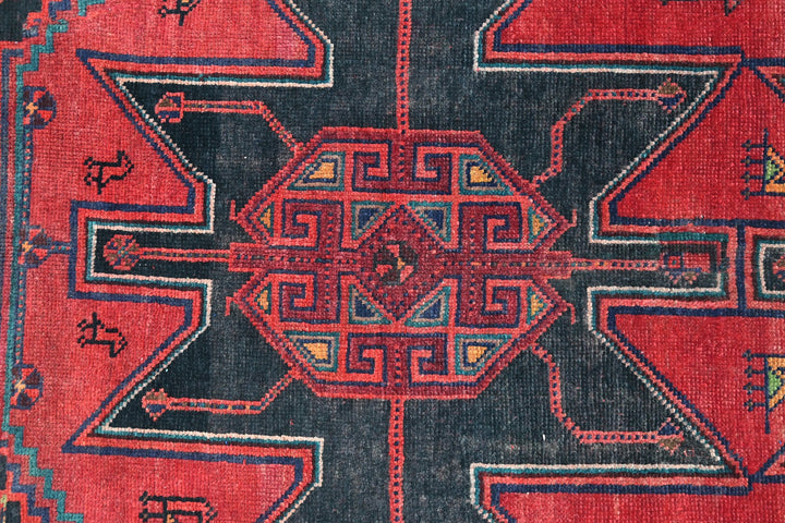red Medium rug 5' 10" x 6' 11"