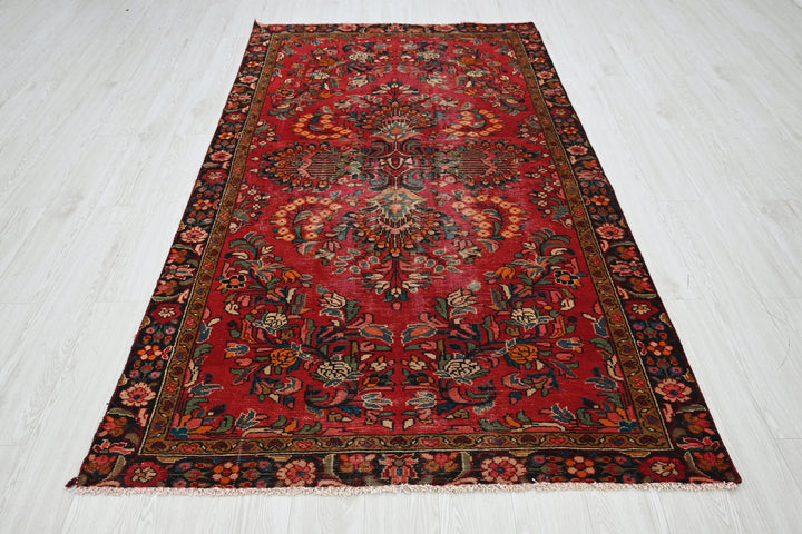 red Medium rug 4' 6" x 8' 3"