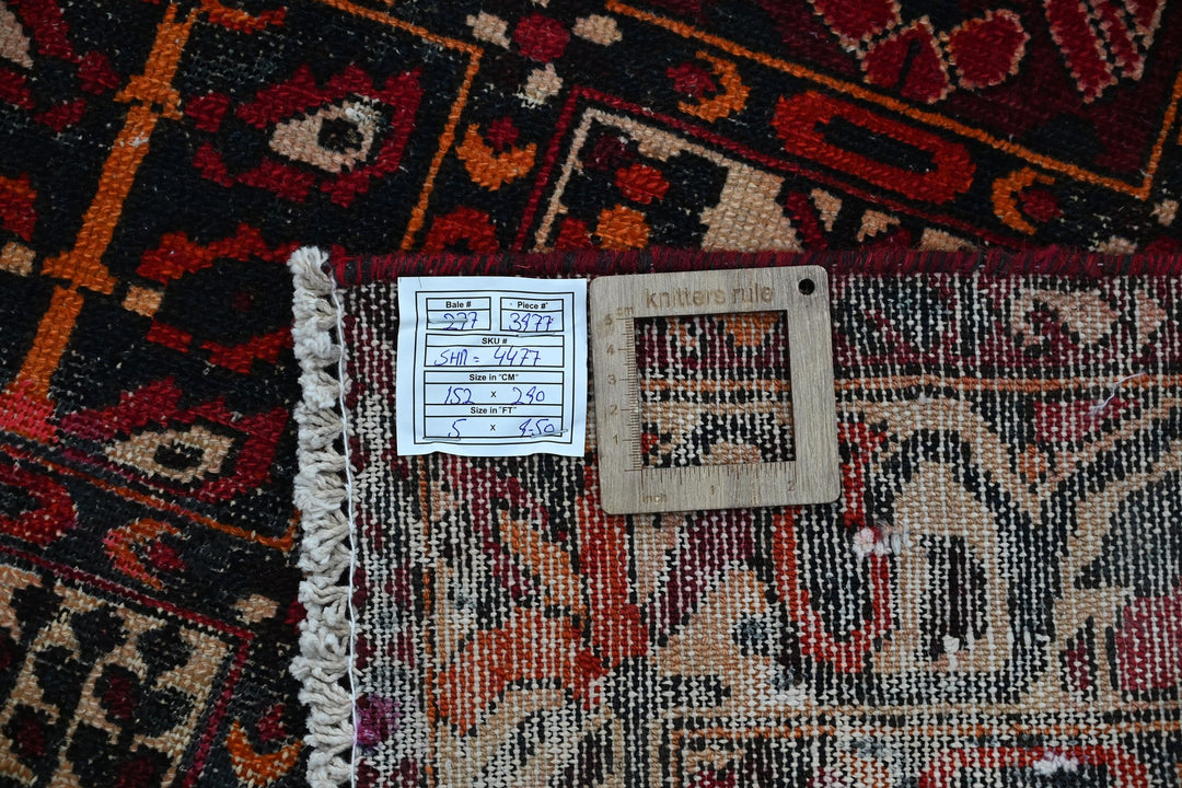 red Large rug 5' 0" x 9' 6"