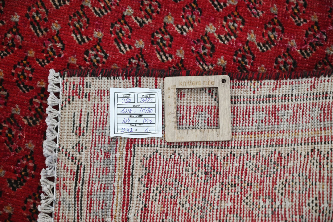 red Accent rug 3' 5" x 6' 0"