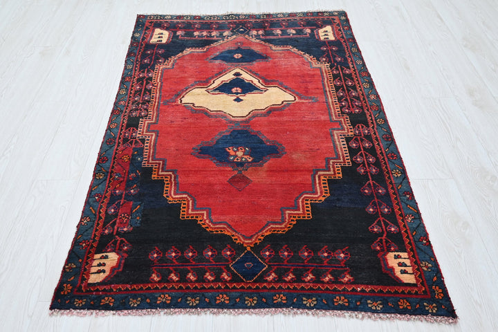 red Accent rug 3' 5" x 5' 6"