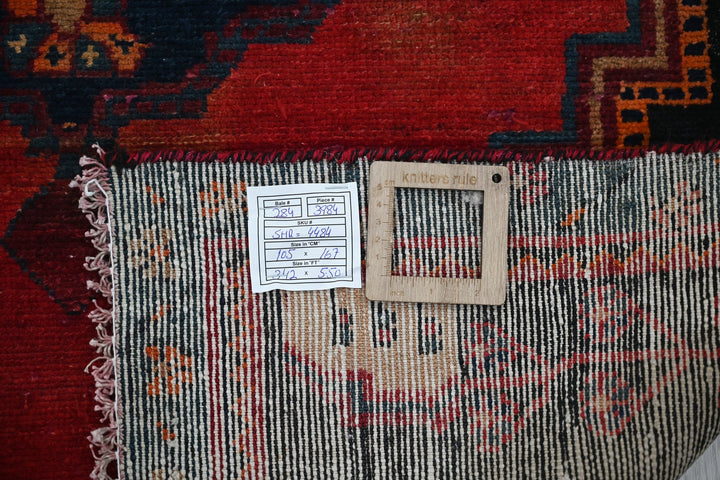 red Accent rug 3' 5" x 5' 6"
