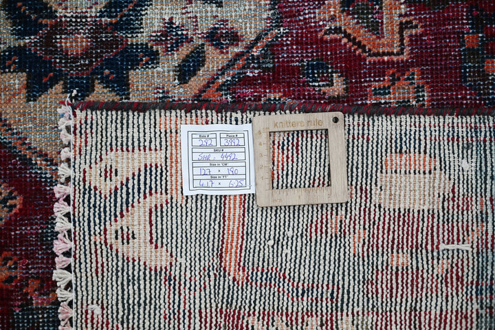 red Accent rug 4' 2" x 6' 3"