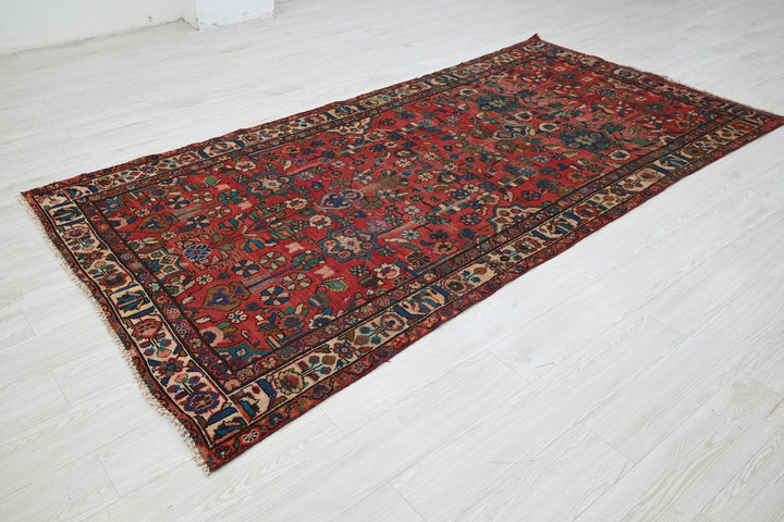 red Medium rug 4' 5" x 9' 1"