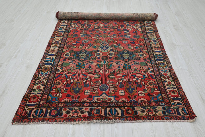 red Medium rug 4' 5" x 9' 1"