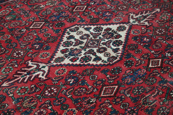 red Large rug 6' 11" x 9' 3"