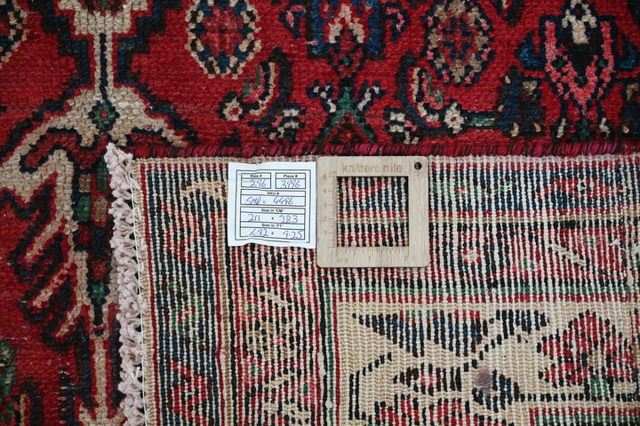 red Large rug 6' 11" x 9' 3"