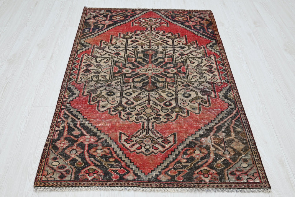 red Accent rug 3' 7" x 5' 8"