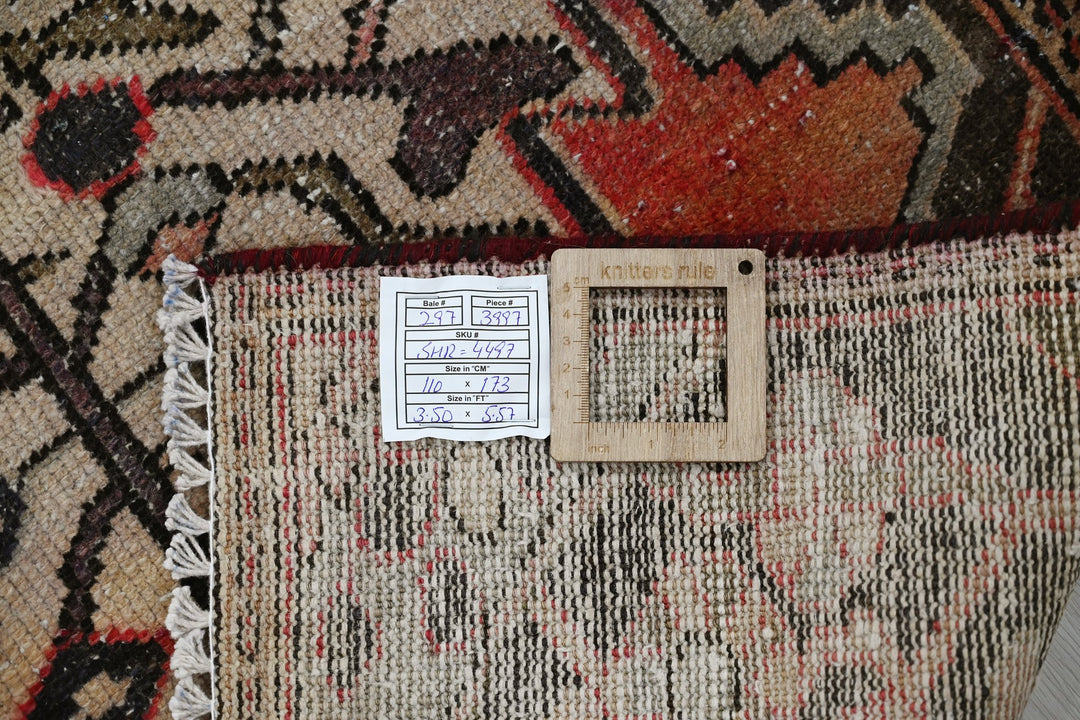 red Accent rug 3' 7" x 5' 8"