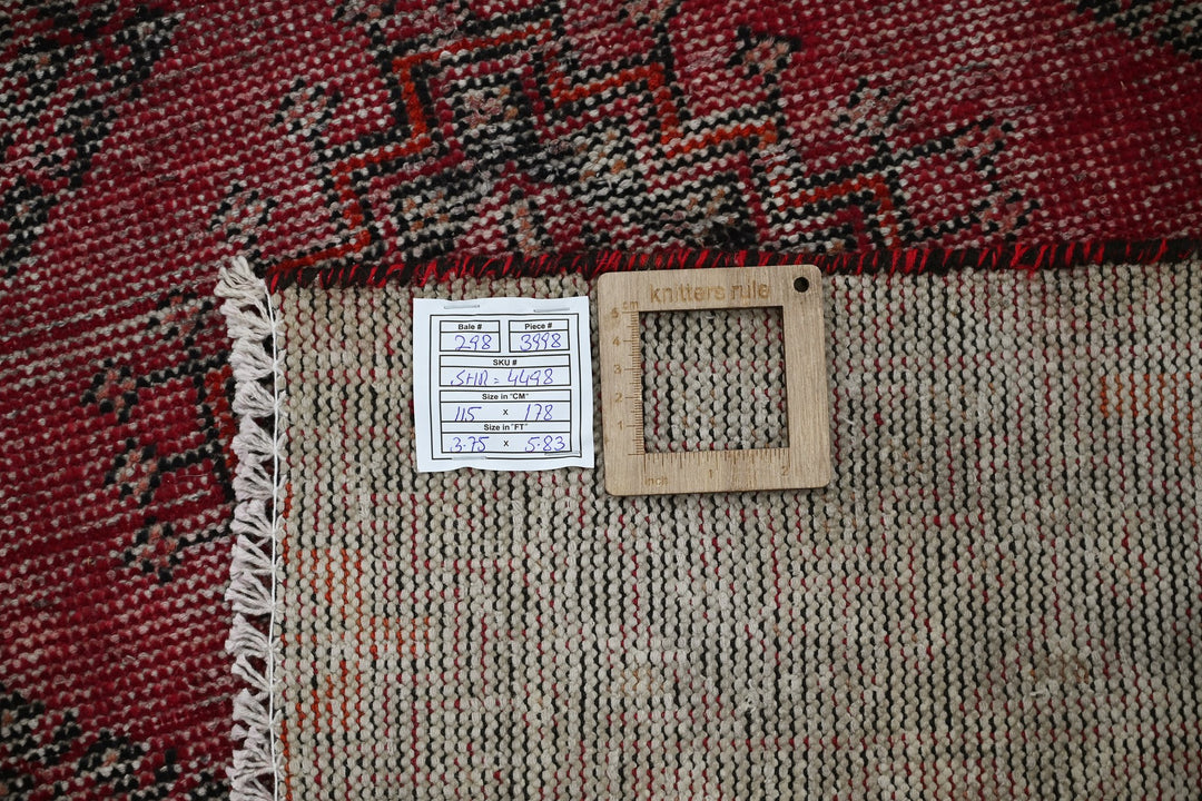 red Accent rug 3' 9" x 5' 10"