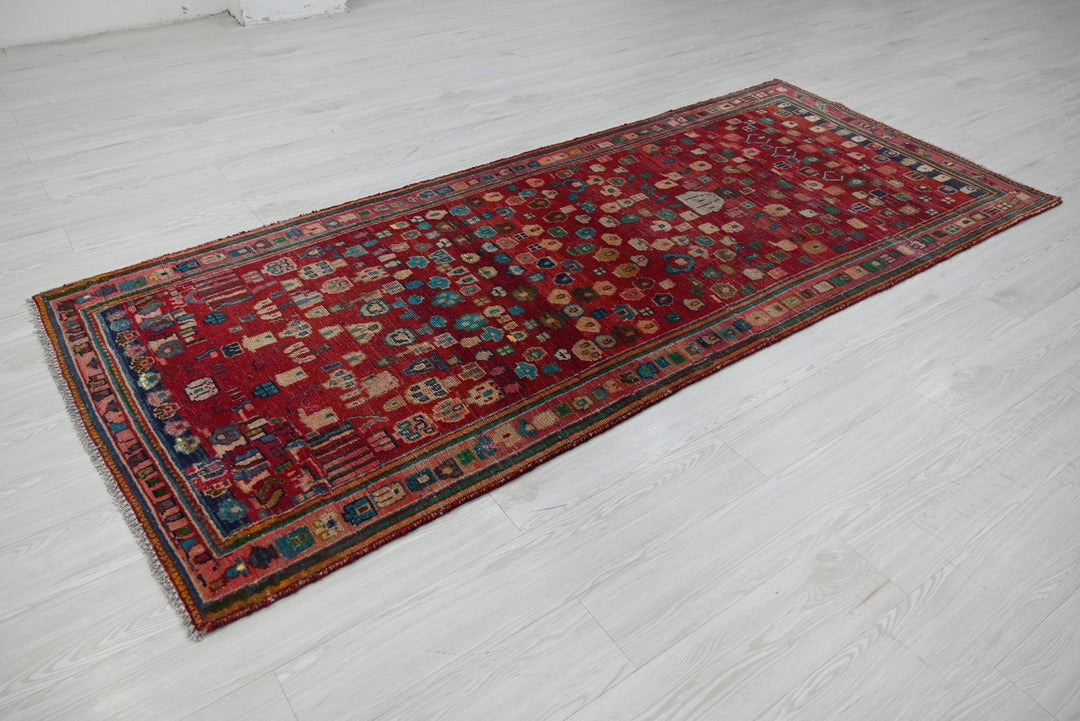 red Medium rug 3' 8" x 8' 7"