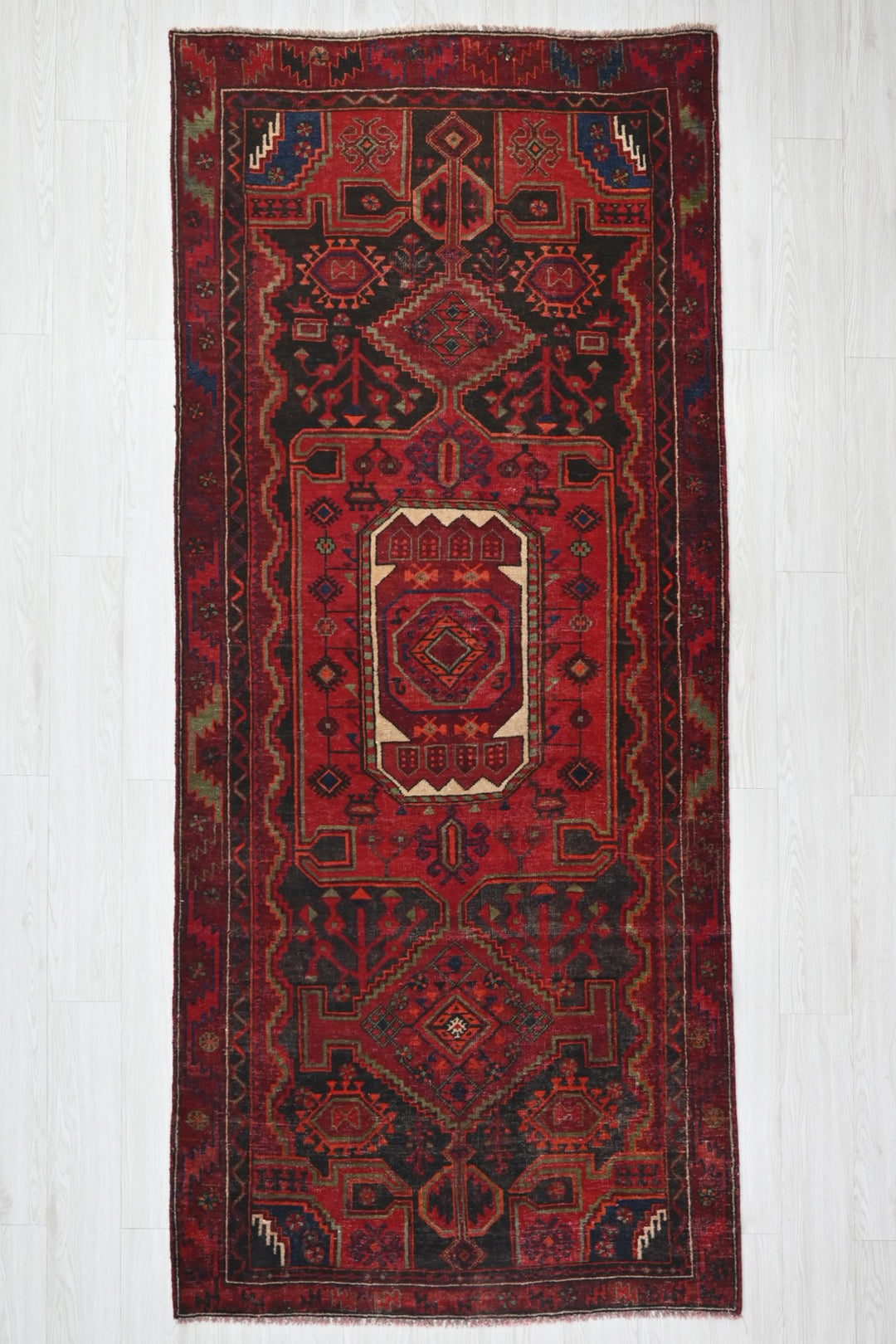 red Medium rug 3' 10" x 8' 9"