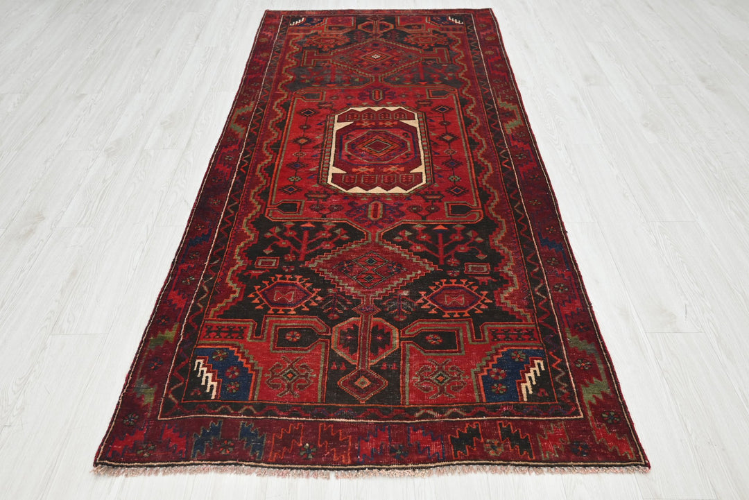 red Medium rug 3' 10" x 8' 9"