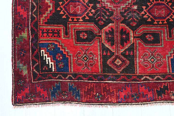 red Medium rug 3' 10" x 8' 9"