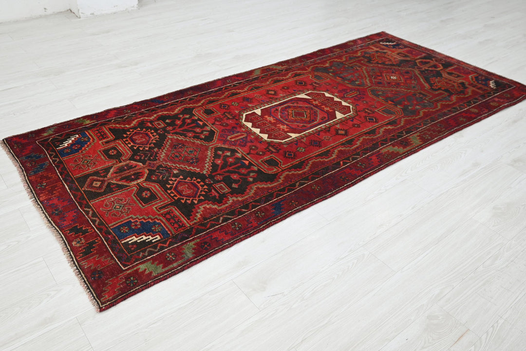 red Medium rug 3' 10" x 8' 9"