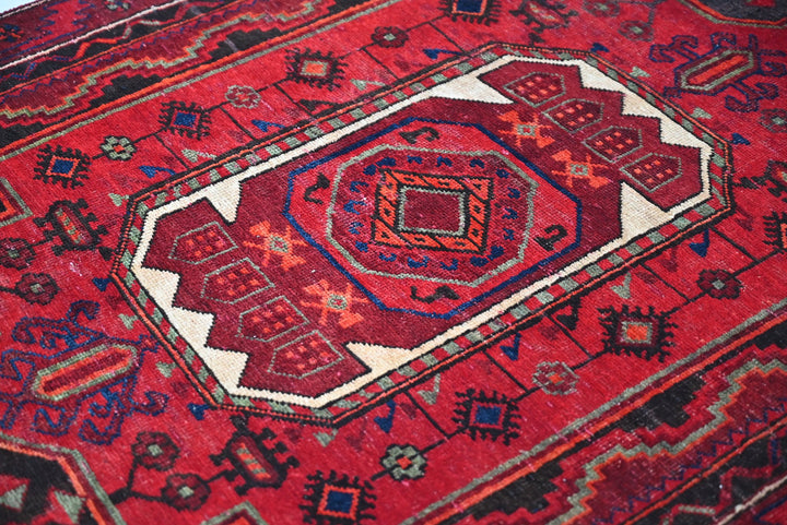 red Medium rug 3' 10" x 8' 9"