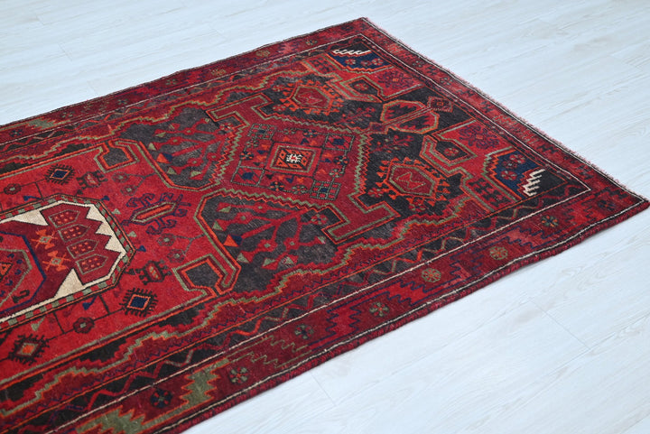 red Medium rug 3' 10" x 8' 9"