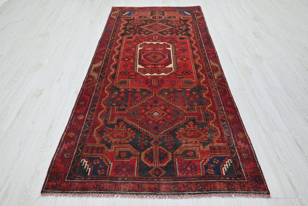 red Medium rug 3' 10" x 8' 9"