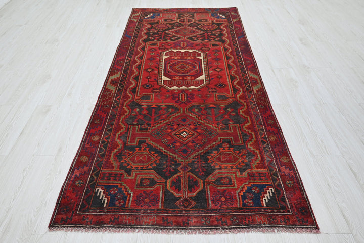 red Medium rug 3' 10" x 8' 9"