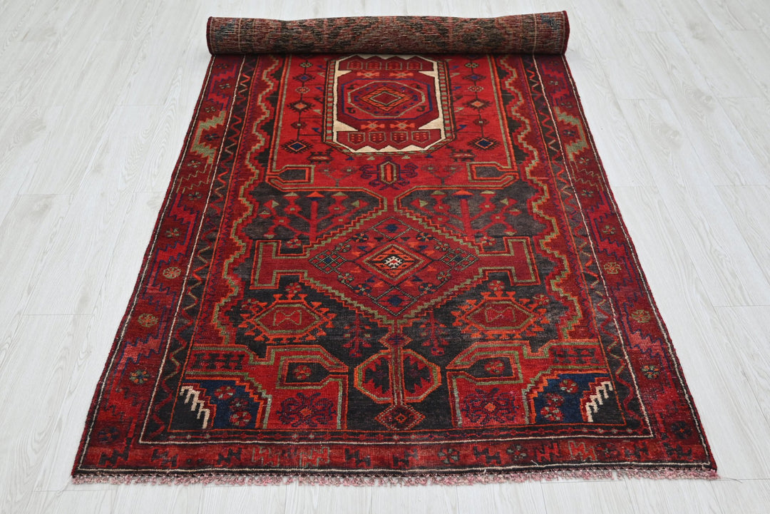 red Medium rug 3' 10" x 8' 9"
