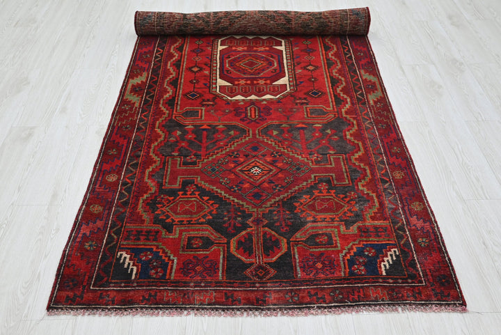red Medium rug 3' 10" x 8' 9"
