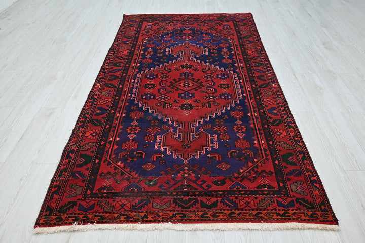 red Medium rug 4' 2" x 7' 10"
